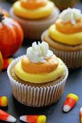 pumpkin-cupcakes-with-candy-corn-buttercream-1626885516-724press